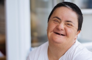 Elderly woman with down syndrome