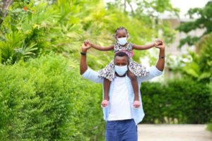 Father and Daugher wearing mask and being resilient during COVID-19